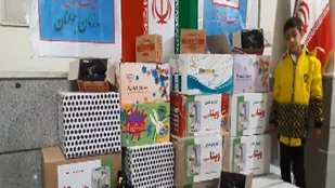 ۲۰۰ جفت کفش اهدایی دانش آموز اسکویی به کودکان جبهه مقاومت