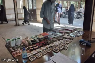 برگزاری نمایشگاه فرهنگی به مناسبت هفته دفاع مقدس در ملایر