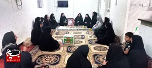 تجلیل از خانواده شهید حسین تاجپور توسط کادر حوزه خواهران کوثر(س) ناحیه لالی