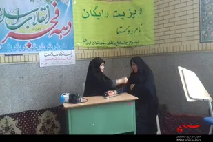 برگزاری ایستگاه کنترل فشار خون و نقاشی کودکان در رزن