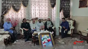 تجلیل از خانواده شهید "امرالله رمضانی" با اهدای هدیه ی رهبری