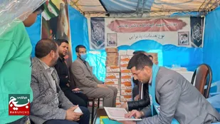 برپایی میز خدمت تعویض اسناد دفترچه&zwnj;ای در گلزار شهدای کرمان