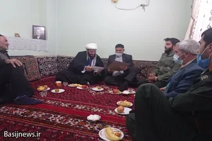 دیدار امام جمعه و پاسداران حوزه امام رضا (ع) مهاجران با خانواده شهدا