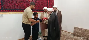 تجلیل مسئول بسیج طلاب کشور از جانباز  کرمانشاهی حماسه &laquo;جنگ ۴۰ روزه&raquo;