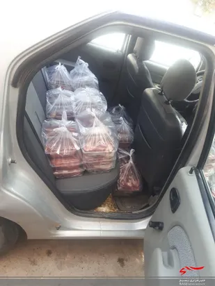 تقدیم400بسته گوشت گرم و برنج