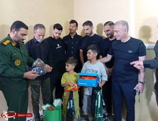 دیدار صمیمانه مسئولان باشگاه خیبر و فرمانده سپاه خرم آباد با خانواده شهید مصطفی بیرانوند+ عکس
