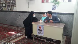 برپائی میز خدمت بسیج در محله های کم برخوردار کرمانشاه