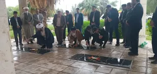 غبارروبی مزار شهدا و تجلیل از خانواده شهدا شهرستان دهلران
