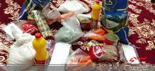 توزیع 40 بسته موادغذایی در منطقه جوادیه بجنورد