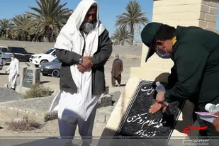 غبار روبی مزار چهار شهید در بخش پسکوه سیب و سوران