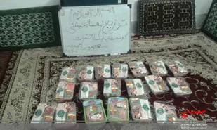 توزیع بسته معیشتی بین نیازمندان روستای قهرمان آباد اسفراین