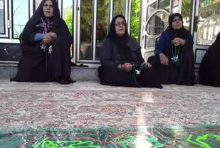 برپایی مجلس روضه خوانی در کنار قبور شهدا