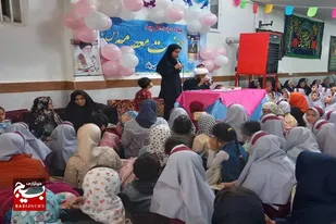 برگزاری جشن روز دختر به یاد دختران شهید مدرسه میناب در دمق