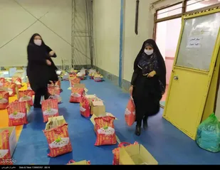 توزیع بسته های معیشتی بین خانواده های نیازمند شهرستان چایپاره  آذربایجان غربی