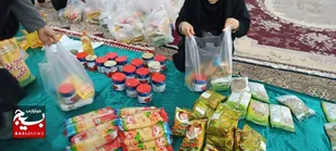 توزیع بسته های معیشتی درشهرسرداران شوشتر