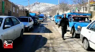 رژه خودرویی جشن انقلاب اسلامی در روستای نام نیک میامی+ فیلم