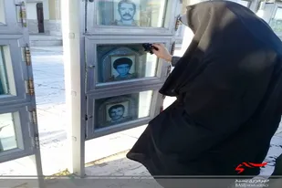 آیین گلباران و عطر افشانی مزار شهدای خواجه ربیع مشهد