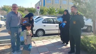 بدرقه فرزند شهید زعیم کهن تا مدرسه؛ توسط فرمانده ناحیه مقاومت بسیج شهرستان ساوجبلاغ