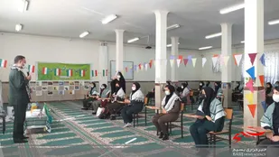 آئین گرامیداشت هفته بسیج در مدارس آسیه و عطیه شهر تنکمان نظرآباد برگزار شد