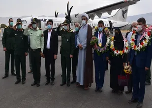 مراسم استقبال از "جواد فروغی"، قهرمان المپیک در فرودگاه شهدای ایلام