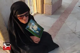 غبارروبی و عطر افشانی قبور مطهر شهدا در شهر کاکی