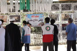 برپایی نمایشگاه عکس در جوار شهدای گمنام شهر کنگان