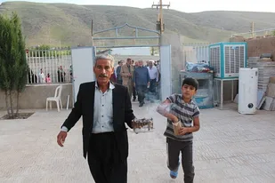 آیین افتتاح مسجد در روستای تپه عظيم سر پل ذهاب