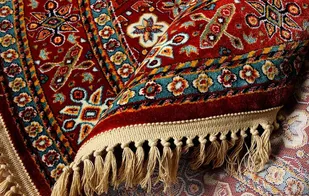 کشف ۷۰ تخته فرش دستباف قاچاق در میان محموله فرش ماشینی