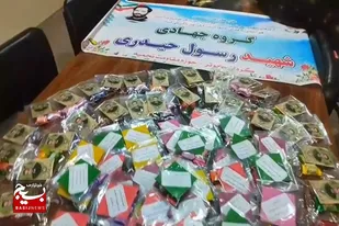 توزیع بسته&zwnj;های رزق معنوی به مناسبت سالگرد شهید &laquo;نظری&raquo; در ملایر