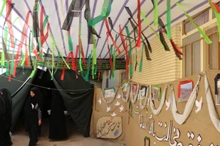 افتتاح نمایشگاه دفاع مقدس در حوزه علمیه لردگان