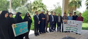 ادای احترام و غبارروبی مزار شهدای گمنام دهلران