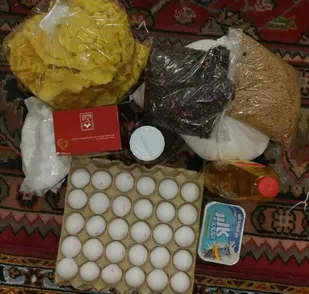تهیه بسته معیشتی و لوازم خانگی و توزیع بین نیازمندان