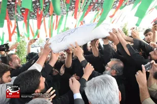 پیکر مطهر شهید گمنام در سایت نمایشگاه بین&zwnj;المللی همدان آرام گرفت