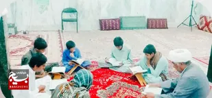 برگزاری آئین جزء خوانی قرآن کریم در روستای گیمان شهر بزمان