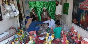 تهیه و توزیع ۷۴ بسته معیشتی به یاد شهدا در کلاته&zwnj;خیج+ تصاویر
