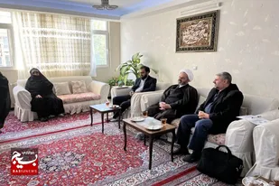 دیدار معاون قضایی دادگستری و مسئول بسیج حقوقدانان استان همدان با خانواده شهدا