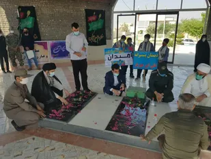 برگزاری مراسم غبار روبی مزار شهدا و نور افشانی در هندیجان