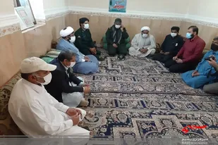 تجلیل از خانواده بسیجی شهید نبی بخش بامری در دلگان