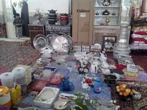 اهدای کمک جهیزیه به زوج جوان در دومین یادواره شهدای مسجد رضوی نیشابور