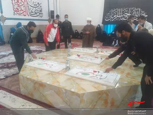 غبار روبی قبور مطهر شهدای گمنام کوهبنان