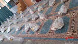 تهیه و توزیع بسته های معیشتی بین نیازمندان و آسین دیدگان از کرونا