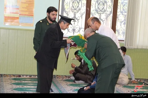 پرچم حرم حضرت علی ابن موسی الرضا در حسینیه سپاه استان البرز