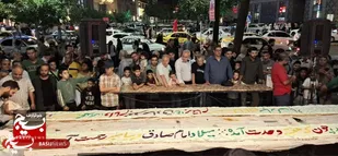آماده سازی و توزیع کیک ۴۰ متری در مشهد