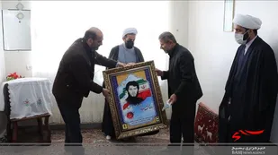دیدار جانشین حوزه نمایندگی ولی فقیه در سپاه کربلا با خانواده روحانی شهید کریمی + تصاویر