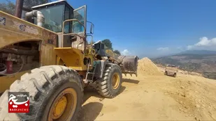 اجرای احداث جاده بین مزارع در روستای بیشه بنه هزارجریب بهشهر