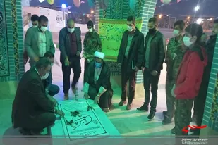 غباروبی و عطرافشانی مزارشهید گمنام کوی سازمانی ارتش خاش