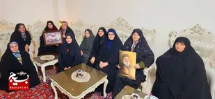 تجلیل از خانواده شهیدان ناظریان+تصاویر