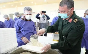 اهدای ۱۰۰۰ کیلو برنج به نیازمندان توسط سپاه بیت المقدس استان کردستان