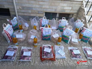 تهیه و توزیع بیش از ۵۰ بسته یلدای مهربانی در روستا&zwnj;های شاهرود