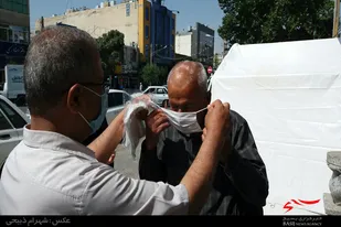 توزیع ماسک رایگان توسط خبرنگاران ملایر